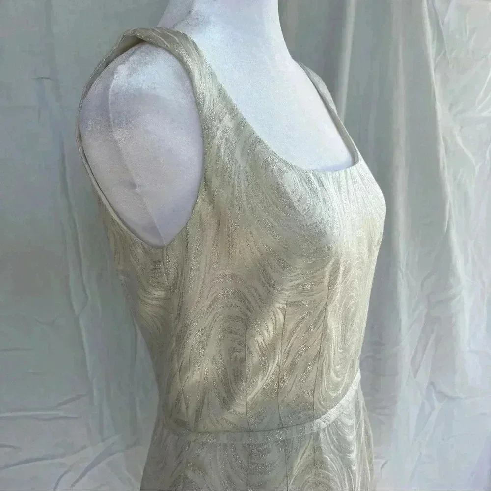 Gianni Bini sleeveless scoop neck cream and silver patterned dress.